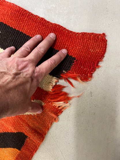 Holes to be repaired on a Navajo Rug